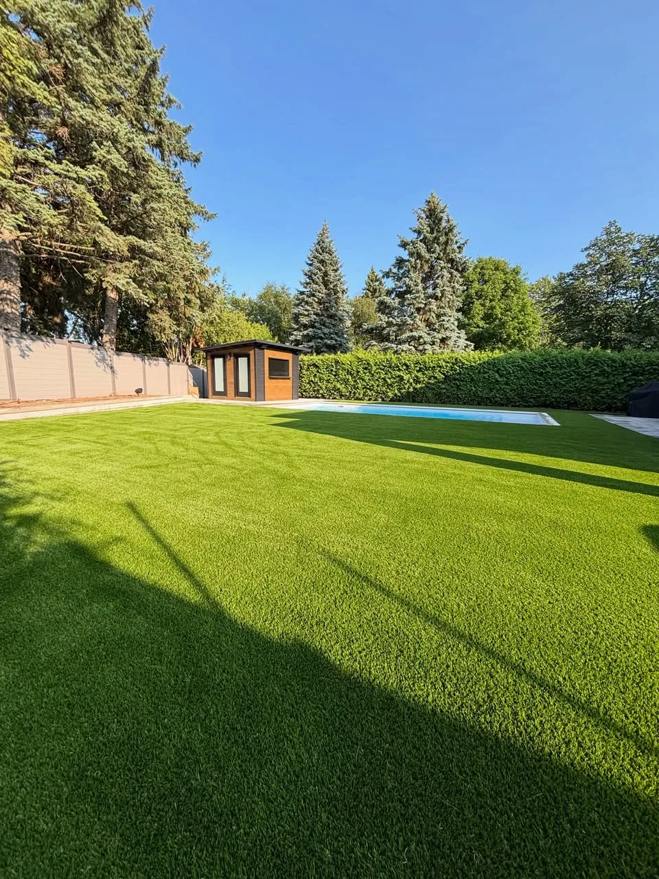 Wide artificial grass lawn installation in Pickering